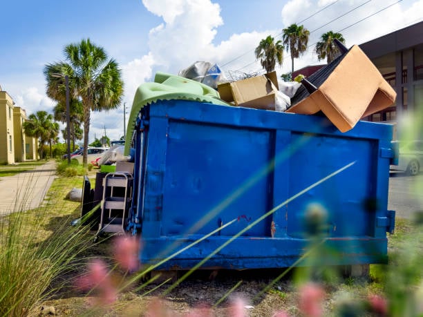 Mobile Attic dumpster placed beside Franklin office building during active commercial renovation
